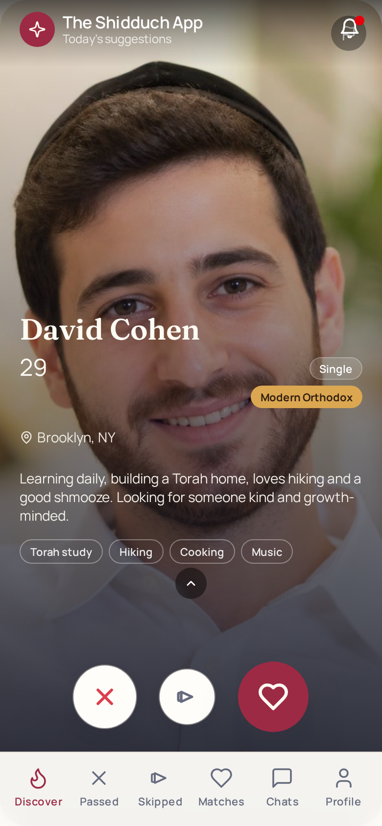 A Discover card in The Shidduch App showing a suggested member with his name, age, city, and hashkafa